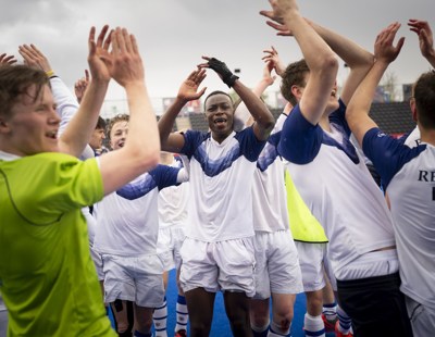 Goalie, Oscar Jensen left, celebrating the win with his team mates (Custom)